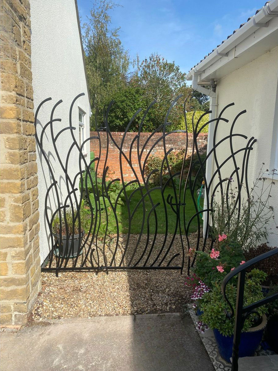 Bespoke garden gate by Ben Horrobin, artist blacksmith Bespoke garden gate by Ben Horrobin, artist blacksmith