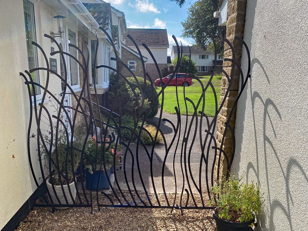 Bespoke garden gate by Ben Horrobin, artist blacksmith Bespoke garden gate by Ben Horrobin, artist blacksmith