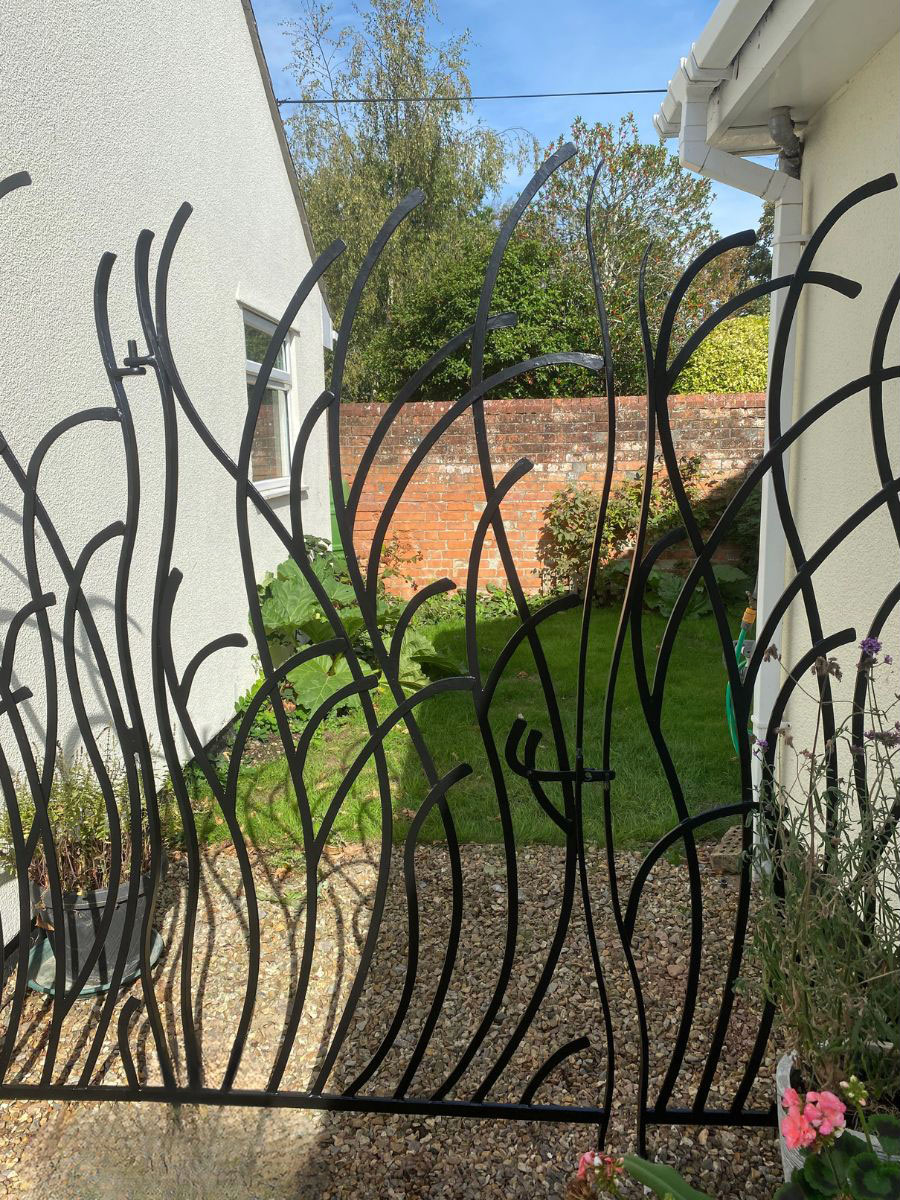 Bespoke garden gate by Ben Horrobin, artist blacksmith Bespoke garden gate by Ben Horrobin, artist blacksmith